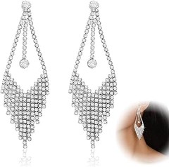 Guía para combinar pendientes largos con tus atuendos de fiesta